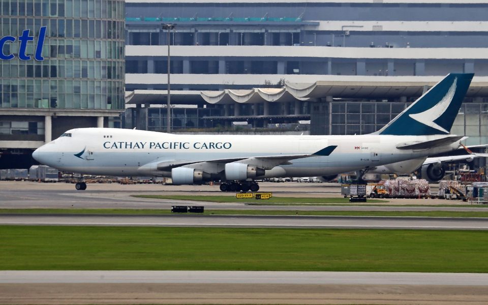 A Boeing 747 cargo aircraft at an airport.